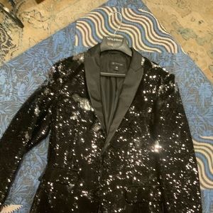 Men’s black sequined dress jacket.